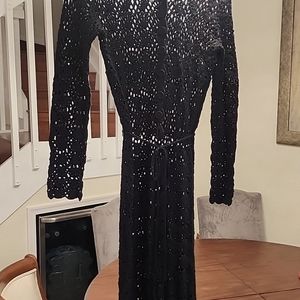 Black crocheted midi dress.Will need a sheeth or full slip (beige or blk under)